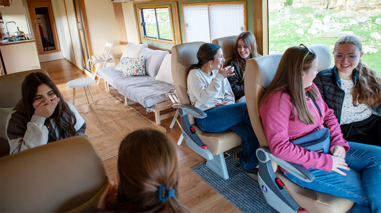 Students talking inside the classroom